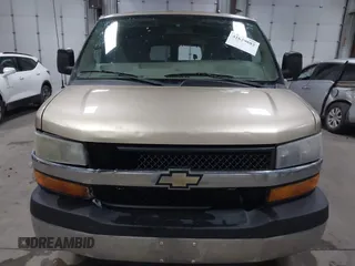 2012 Chevrolet Express Passenger 1LT z VIN 1GAZG1FAXC1127760, wystawiony jako IAAI lot #41629882 z przebiegiem 311 110 mil mil oraz . Historia ofert i sprzedaży dostępna na DreamBid. Obrazek 12.