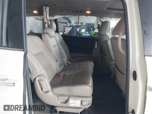 2015 Honda Odyssey EX-L with VIN 5FNRL5H64FB084175, listed as a IAAI auction lot 41943540 with 67,902 mi miles and . Bid and sale history available at carsss.com. Image 8.
