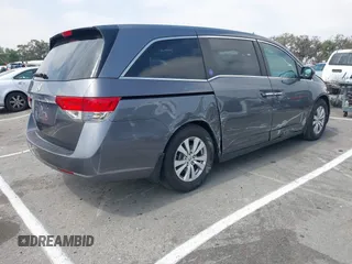 2014 Honda Odyssey EX-L with VIN 5FNRL5H64EB026520, listed as a IAAI auction lot 42562290 with 118,890 mi miles and . Bid and sale history available at DreamBid. Image 4.