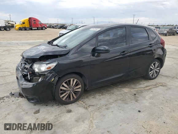 2015 Honda Fit EX-L with VIN 3HGGK5H86FM702976, listed as a Copart auction lot 59439045 with 164,932 mi miles and Salvage title. Bid and sale history available at DreamBid. Image 1.
