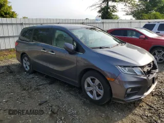 2019 Honda Odyssey EX with VIN 5FNRL6H58KB013889, listed as a Copart auction lot 57077025 with 126,467 mi miles and Salvage title. Bid and sale history available at DreamBid. Image 4.