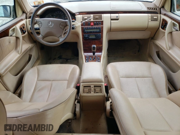 2001 Mercedes-Benz E-Class with VIN WDBJF65J01B389296, listed as a Copart auction lot 71933404 with 124,392 mi miles and Salvage Title. Bid and sale history available at carsss.com. Image 8.