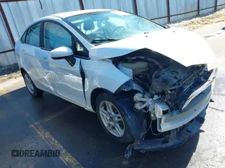 2017 Ford Fiesta SE z VIN 3FADP4BJ2HM115692, wystawiony jako IAAI lot #41777823 z przebiegiem 120 202 mil mil oraz . Historia ofert i sprzedaży dostępna na DreamBid. Obrazek 1.