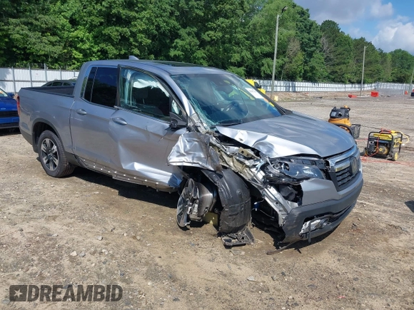 2020 Honda Ridgeline RTL with VIN 5FPYK3F5XLB025857, listed as a IAAI auction lot 42307343 with 97,262 mi miles and . Bid and sale history available at DreamBid. Image 1.