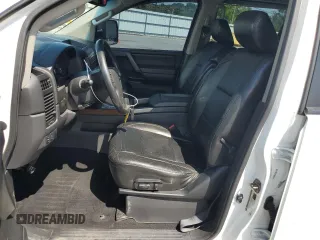 2012 Nissan Titan SV with VIN 1N6BA0EC5CN324882, listed as a Copart auction lot 62551995 with 189,385 mi miles and Salvage title. Bid and sale history available at DreamBid. Image 7.