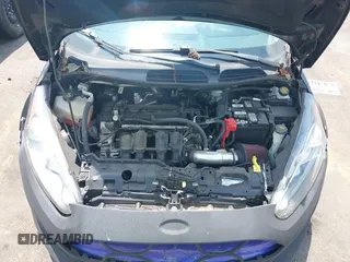 2018 Ford Fiesta S z VIN 3FADP4AJ0JM131607, wystawiony jako IAAI lot #42707624 z przebiegiem 109 815 mil mil oraz . Historia ofert i sprzedaży dostępna na DreamBid. Obrazek 10.