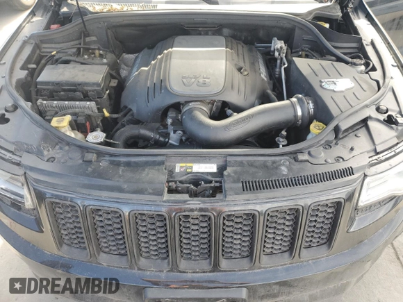 2014 Jeep Grand Cherokee Overland with VIN 1C4RJFCT2EC106002, listed as a Copart auction lot 48763675 with 143,011 mi miles and Salvage Title. Bid and sale history available at DreamBid. Image 12.