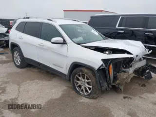 2014 Jeep Cherokee Latitude with VIN 1C4PJLCB5EW116339, listed as a IAAI auction lot 41679936 with 139,496 mi miles. Bid and sale history available at carsss.com. Image 1.