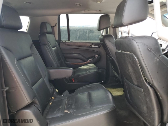 2015 Chevrolet Suburban LTZ with VIN 1GNSCKKCXFR216890, listed as a Copart auction lot 52695155 with 233,296 mi miles and Clean Title. Bid and sale history available at carsss.com. Image 11.