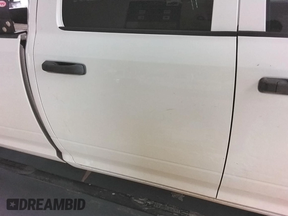 2017 Ram 2500 Tradesman z VIN 3C6TR5HT0HG771975, wystawiony jako IAAI lot #42801757 z przebiegiem 185 058 mil mil oraz . Historia ofert i sprzedaży dostępna na DreamBid. Obrazek 4.