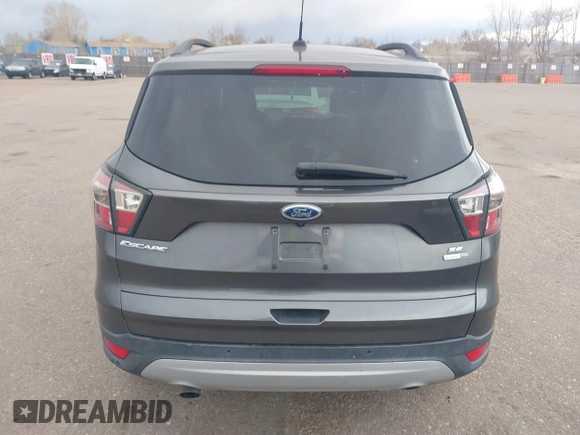 2017 Ford Escape SE with VIN 1FMCU9GD1HUB46034, listed as a IAAI auction lot 41840906 with 143,806 mi miles. Bid and sale history available at carsss.com. Image 16.