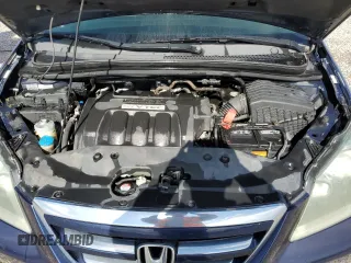 2006 Honda Odyssey EX z VIN 5FNRL38496B023830, wystawiony jako Copart lot #57497265 z przebiegiem 123 839 mil mil oraz Szkoda całkowita • Salvage title. Historia ofert i sprzedaży dostępna na DreamBid. Obrazek 11.