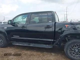 2012 Toyota Tundra 4WD Truck with VIN 5TFDW5F15CX259012, listed as a IAAI auction lot 42083986 with 1 mi miles. Bid and sale history available at carsss.com. Image 14.