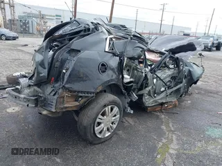 2015 Cadillac SRX with VIN 3GYFNAE36FS573940, listed as a IAAI auction lot 41808779 with Not Provided miles and . Bid and sale history available at DreamBid. Image 4.
