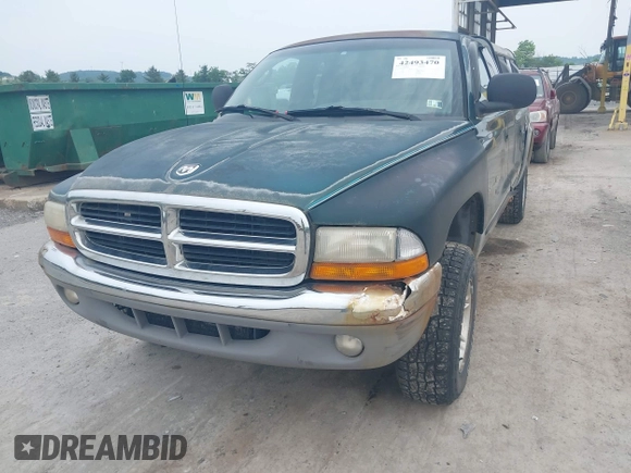 1999 Dodge Dakota SLT z VIN 1B7GG22X0XS104969, wystawiony jako IAAI lot #42493470 z przebiegiem 160 019 mil mil oraz . Historia ofert i sprzedaży dostępna na DreamBid. Obrazek 6.