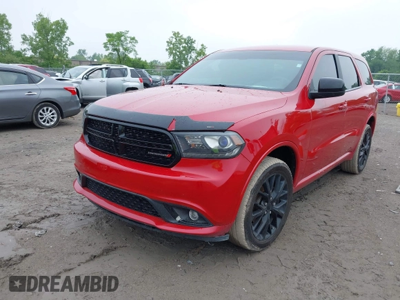 2015 Dodge Durango SXT with VIN 1C4RDJAG2FC128082, listed as a IAAI auction lot 42447872 with 141,655 mi miles and . Bid and sale history available at DreamBid. Image 2.