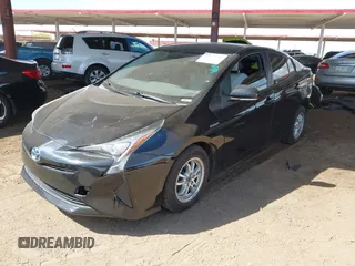 2016 Toyota Prius Two with VIN JTDKBRFUXG3503142, listed as a IAAI auction lot 42027700 with 185,319 mi miles. Bid and sale history available at carsss.com. Image 18.