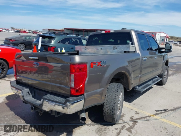 2020 Ford F-250 XL with VIN 1FT7W2B62LEE05827, listed as a IAAI auction lot 41816519 with 128,457 mi miles and . Bid and sale history available at DreamBid. Image 4.