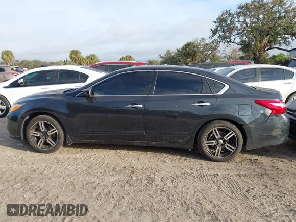 2017 Nissan Altima S with VIN 1N4AL3AP4HC159628, listed as a IAAI auction lot 40942263 with 156,730 mi miles and . Bid and sale history available at DreamBid. Image 14.