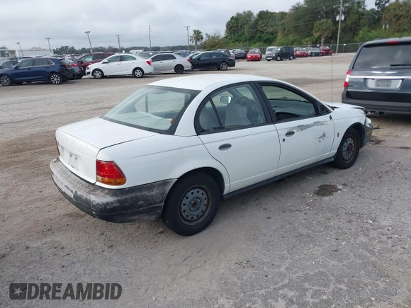 1999 Saturn SL with VIN 1G8ZH5284XZ318834, listed as a IAAI auction lot 41486518 with 178,227 mi miles. Bid and sale history available at carsss.com. Image 4.
