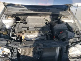 2009 Kia Spectra LX with VIN KNAFE221895659552, listed as a Copart auction lot 82555924 with 114,704 mi miles and Salvage Title. Bid and sale history available at carsss.com. Image 13.