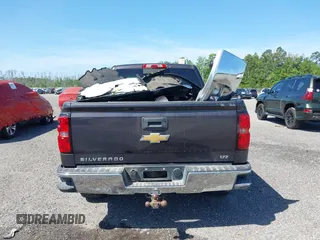 2014 Chevrolet Silverado 1500 LTZ with VIN 3GCUKSEC8EG536076, listed as a IAAI auction lot 41464408 with 133,418 mi miles and . Bid and sale history available at DreamBid. Image 16.