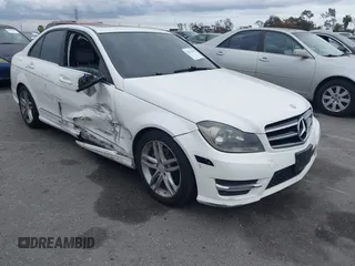 2014 Mercedes-Benz C-Class C 250 Sport with VIN WDDGF4HB9EA945465, listed as a IAAI auction lot 42035693 with 146,809 mi miles. Bid and sale history available at carsss.com. Image 1.