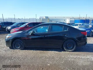 2017 Subaru Impreza with VIN 4S3GKAA68H1605729, listed as a IAAI auction lot 41190447 with 118,115 mi miles. Bid and sale history available at carsss.com. Image 14.