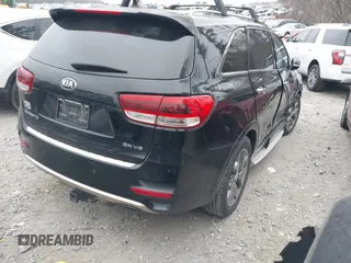 2016 Kia Sorento SXL z VIN 5XYPK4A50GG005018, wystawiony jako IAAI lot #41173657 z przebiegiem 120 094 mil mil oraz . Historia ofert i sprzedaży dostępna na DreamBid. Obrazek 4.