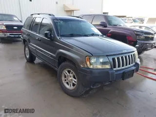 2004 Jeep Grand Cherokee Laredo with VIN 1J4GX48S04C394024, listed as a IAAI auction lot 41982608 with 142,825 mi miles. Bid and sale history available at carsss.com. Image 1.