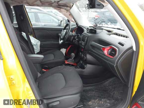 2015 Jeep Renegade Trailhawk with VIN ZACCJBCT9FPB95949, listed as a IAAI auction lot 41558291 with 60,682 mi miles and . Bid and sale history available at DreamBid. Image 5.