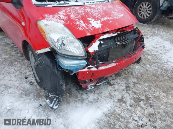 2011 Toyota Yaris with VIN JTDJT4K34B5329980, listed as a IAAI auction lot 41393540 with 84,987 mi miles. Bid and sale history available at carsss.com. Image 19.