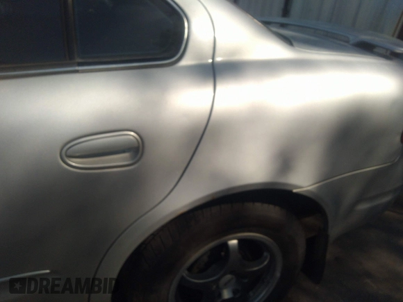 2003 Oldsmobile Alero GL1 with VIN 1G3NL52EX3C277972, listed as a IAAI auction lot 35153780 with Not Provided miles and . Bid and sale history available at DreamBid. Image 6.