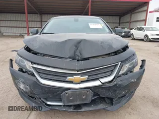 2015 Chevrolet Impala LS with VIN 1G11X5SL3FU131695, listed as a IAAI auction lot 41463906 with 104,380 mi miles and . Bid and sale history available at DreamBid. Image 13.