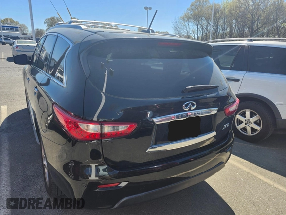 2013 Infiniti JX35 z VIN 5N1AL0MMXDC328874, wystawiony jako IAAI lot #41928856 z przebiegiem 153 605 mil mil oraz . Historia ofert i sprzedaży dostępna na DreamBid. Obrazek 3.