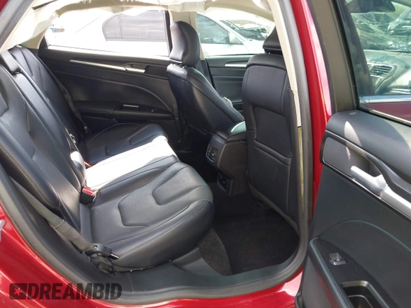 2017 Ford Fusion Titanium with VIN 3FA6P0K98HR207447, listed as a IAAI auction lot 42422213 with 59,549 mi miles and . Bid and sale history available at DreamBid. Image 8.