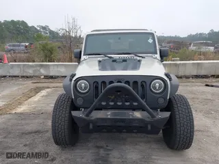 2007 Jeep Wrangler Unlimited X with VIN 1J4GA391X7L107424, listed as a IAAI auction lot 41752013 with 196,557 mi miles. Bid and sale history available at carsss.com. Image 6.