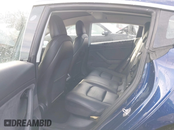 2018 Tesla Model 3 Long Range Battery with VIN 5YJ3E1EB8JF115138, listed as a IAAI auction lot 41343399 with 62,351 mi miles and . Bid and sale history available at DreamBid. Image 8.