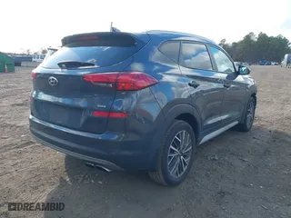 2021 Hyundai Tucson Sport with VIN KM8J3CAL6MU389601, listed as a IAAI auction lot 40985601 with 66,013 mi miles. Bid and sale history available at carsss.com. Image 4.