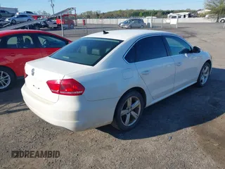 2013 Volkswagen Passat SE w/Sunroof & Nav with VIN 1VWBP7A32DC017647, listed as a IAAI auction lot 41991170 with 270,917 mi miles. Bid and sale history available at carsss.com. Image 4.