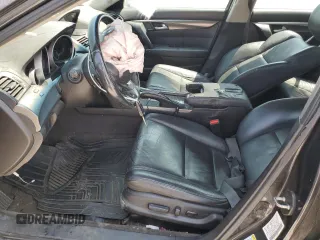 2013 Acura TL z VIN 19UUA8F28DA010699, wystawiony jako Copart lot #58672465 z przebiegiem 196 858 mil mil oraz Szkoda całkowita • Salvage title. Historia ofert i sprzedaży dostępna na DreamBid. Obrazek 7.