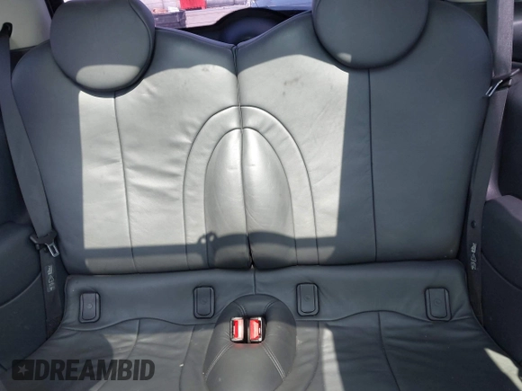 2006 MINI Hardtop S with VIN WMWRE33596TJ35502, listed as a IAAI auction lot 42474204 with 126,938 mi miles and . Bid and sale history available at DreamBid. Image 8.
