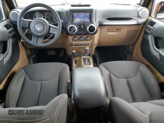 2015 Jeep Wrangler Unlimited Sahara z VIN 1C4BJWEG5FL645846, wystawiony jako Copart lot #53326855 z przebiegiem 122 510 mil mil oraz Szkoda całkowita • Salvage title. Historia ofert i sprzedaży dostępna na DreamBid. Obrazek 8.