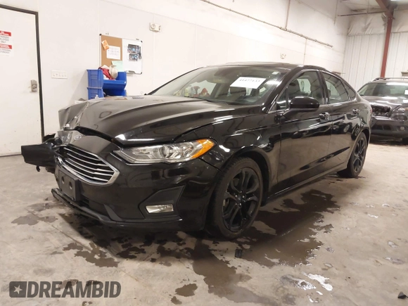 2019 Ford Fusion SE with VIN 3FA6P0HD5KR284103, listed as a IAAI auction lot 41477133 with 90,722 mi miles and . Bid and sale history available at carsss.com. Image 2.