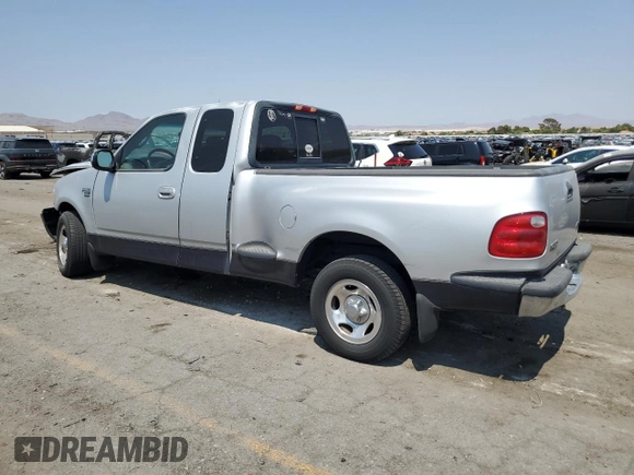 2001 Ford F-150 XL with VIN 1FTRX07L71KA57207, listed as a Copart auction lot 64843825 with Not provided miles and Salvage title. Bid and sale history available at DreamBid. Image 2.