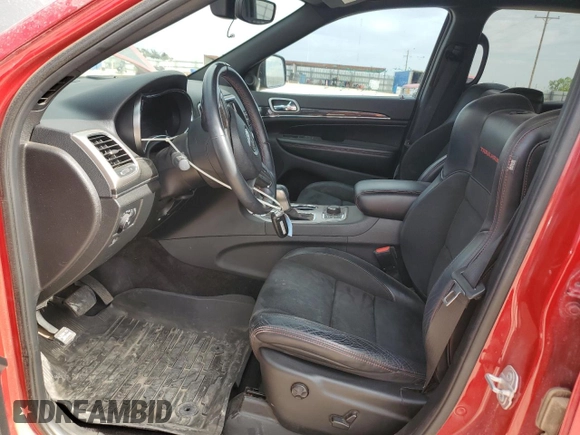 2018 Jeep Grand Cherokee Trailhawk with VIN 1C4RJFLGXJC477597, listed as a Copart auction lot 56338075 with 91,443 mi miles and Salvage title. Bid and sale history available at DreamBid. Image 7.