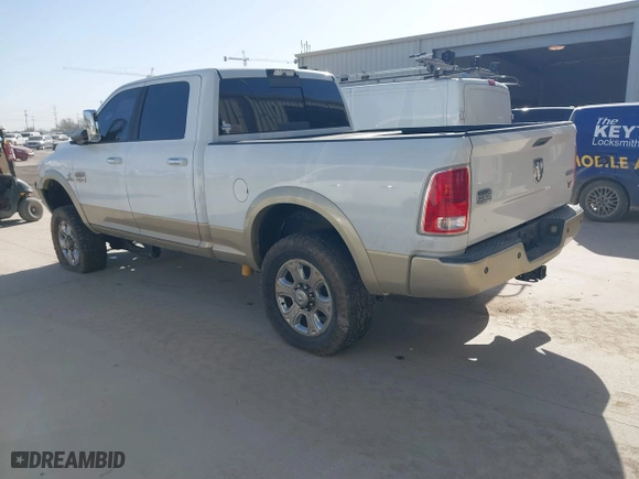 2014 Ram 2500 Longhorn with VIN 3C6UR5GLXEG244401, listed as a IAAI auction lot 41779709 with 180,760 mi miles. Bid and sale history available at carsss.com. Image 3.
