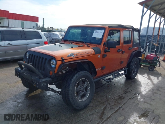 2010 Jeep Wrangler Unlimited Sport with VIN 1J4HA3H1XAL189667, listed as a IAAI auction lot 42062351 with 144,838 mi miles. Bid and sale history available at carsss.com. Image 17.