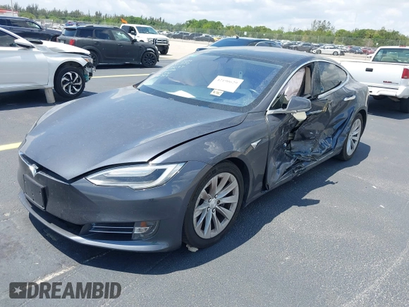 2017 Tesla Model S 60 с VIN 5YJSA1E10HF220006, выставлен на аукционе IAAI как лот 42190629 с пробегом 64 350 миль миль и . История ставок и продаж доступна на DreamBid. Изображение 2.