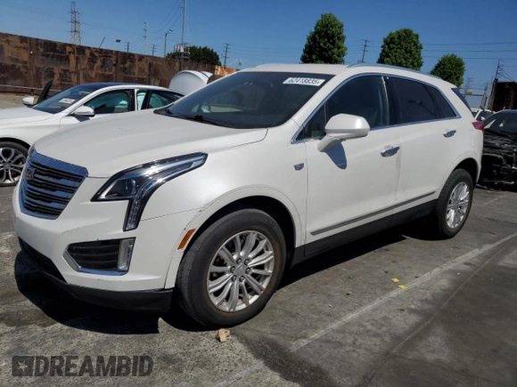 2018 Cadillac XT5 AWD with VIN 1GYKNBRS0JZ128529, listed as a Copart auction lot 62418835 with 50,051 mi miles and Salvage title. Bid and sale history available at DreamBid. Image 1.